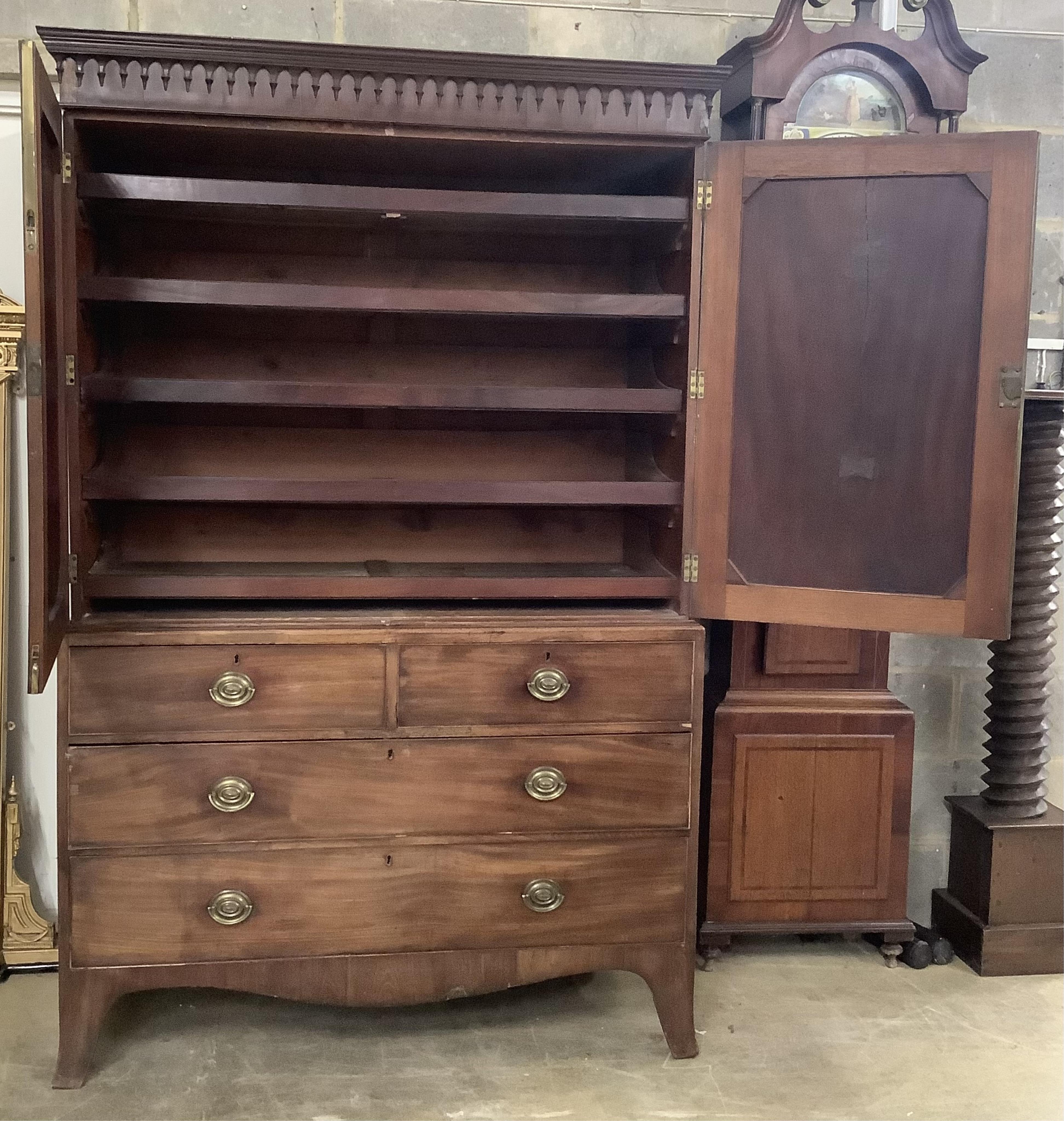 A George III mahogany linen press, width 130cm, depth 61cm, height 202cm. Condition - fair